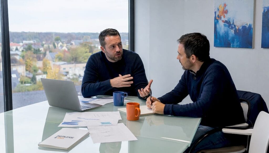 Des dirigeants de PME échangent au bureau autour d’un projet d’intelligence artificielle.